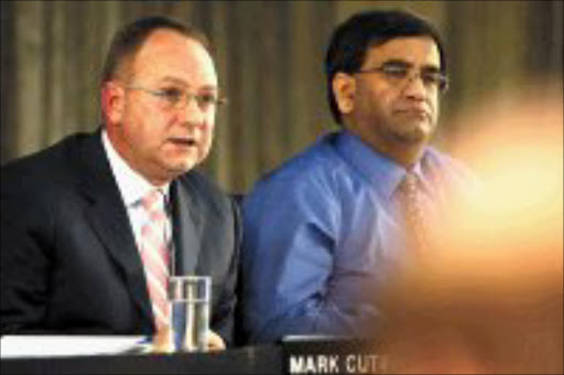 MAKING MINE SHINE: AngloGold's chief executive, Mark Cutifani, and chief financial officer, Srinivasan Venkatakrishnan. Pic. Marianne Schwankhart. 08/02/08. © Sunday Times.\n\n\n\nUsed: FM 22/02/2008 PG 58. Mark Cutifani. Work to do.