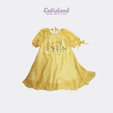 Đầm tơ vàng thêu hoa đô Cutieland