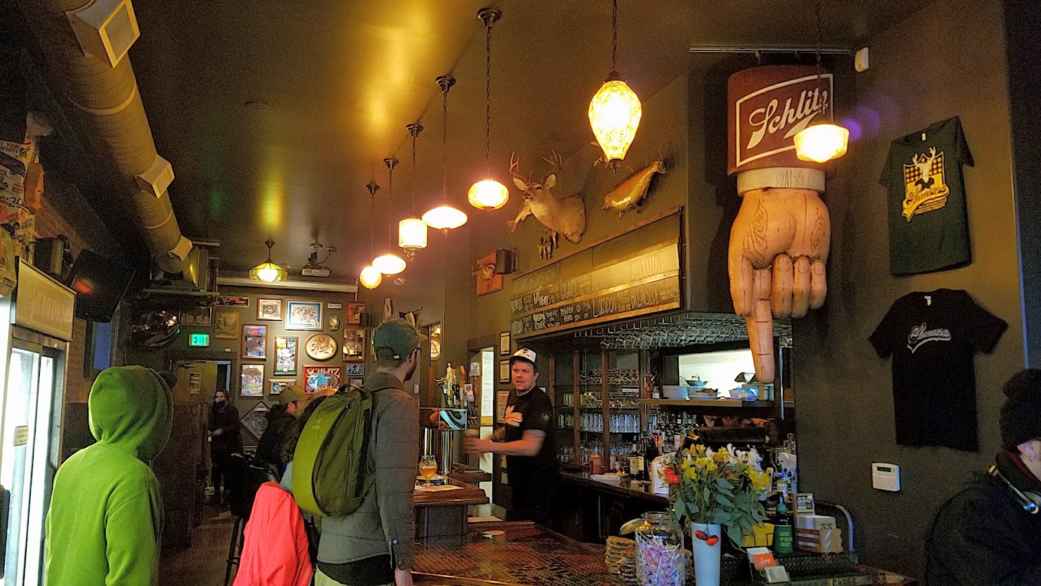 When you walk through that door of Saraveza, you immediately feel a bit like you're in a beer museum with all the retro beer paraphernalia all along the walls and the brightly lit coolers of their literally hundreds of beer by the bottle in addition to their 10 rotating taps