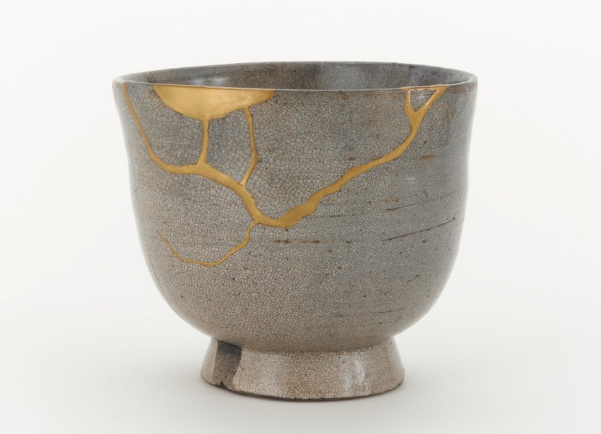 Tea bowl, possibly Satsuma ware; possibly Kagoshima prefecture, Japan, Edo period, 17th century; stoneware with clear, crackled glaze, stained by ink; gold lacquer repairs; Gift of Charles Lang Freer, F1904.323 