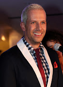 CAPE TOWN, SOUTH AFRICA - AUGUST 14: Jonathan Boynton-Lee wins the My Top Billing Dream presenter search competition on August 14, 2012 in Cape Town, South Africa. He beat out ten other hopefuls to become a new presenter on the lifestyle show.