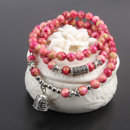 Title 3, Multi-layer multi-circle beaded bracelet, an el...