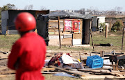 A member of the Red Ants during the shack demolitions in Dunoon, Cape Town, on April 25 2019.