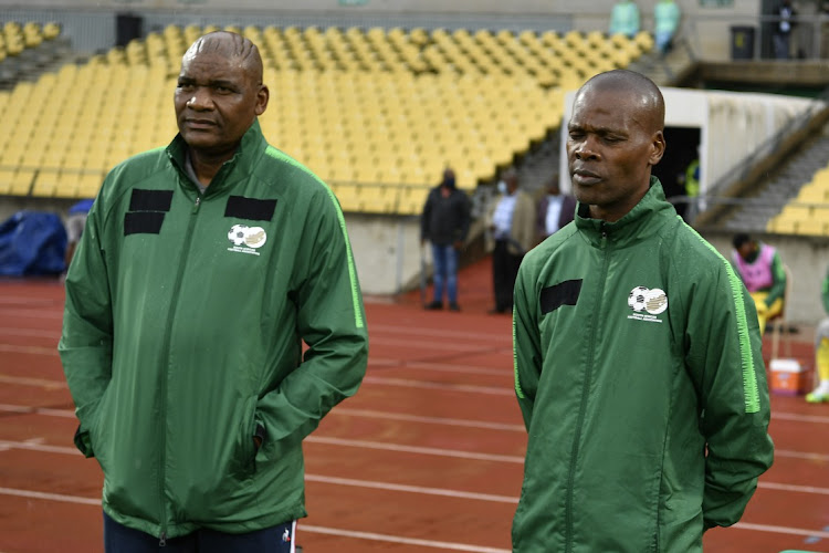 South African coach Molefi Ntseki with his assistant Arthur Zwane during the International Friendly match between South Africa and Zambia at Royal Bafokeng Stadium on October 11, 2020 in Rustenburg.