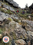 On several occasions rescuers had to use ropes to safely navigate steep and wet sections of the trail.
Photo by Werner Badenhorst