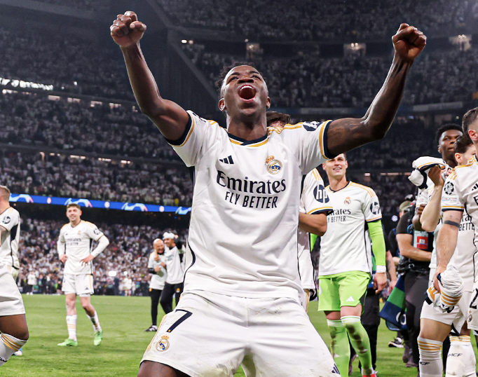 Real Madrid Midfielder Vinicious Junior celebrating after qualifying for finals.