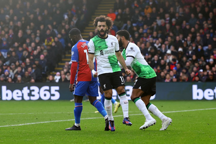 Liverpool's Mohamed Salah celebrates scoring their first goal.