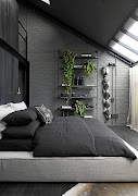 In the bedroom, double-volume ceilings and sliding doors that open onto a private balcony aid the sense of loftiness.