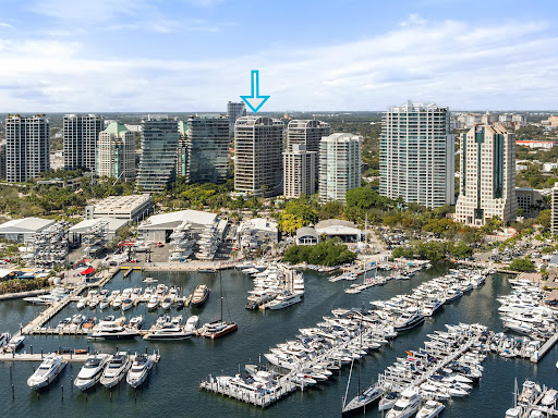 Aerial view marina and luxury buildings in this luxury apartment / penthouse for sale in Miami ($1,199,000)