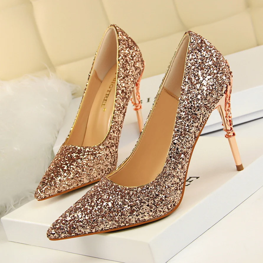 Pointed sequined high heels for women. Sparkle and shine at your next event. These elegant shoes are perfect for parties