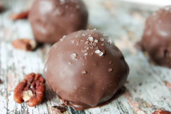 Salt sprinkled onto pecan pie ball.