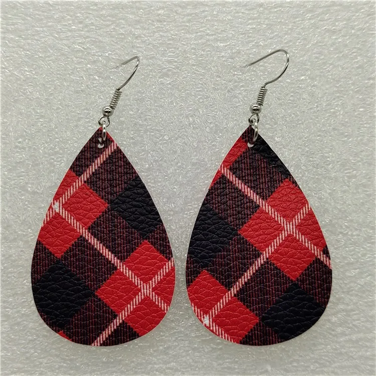Druppelvormige leren oorbellen met duplex print, stijlvol en lichtgewicht. Ervaar de verfijning en unieke stijl van deze accessoires.