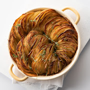 Crispy paper-thin roasted potatoes with fresh herbs.