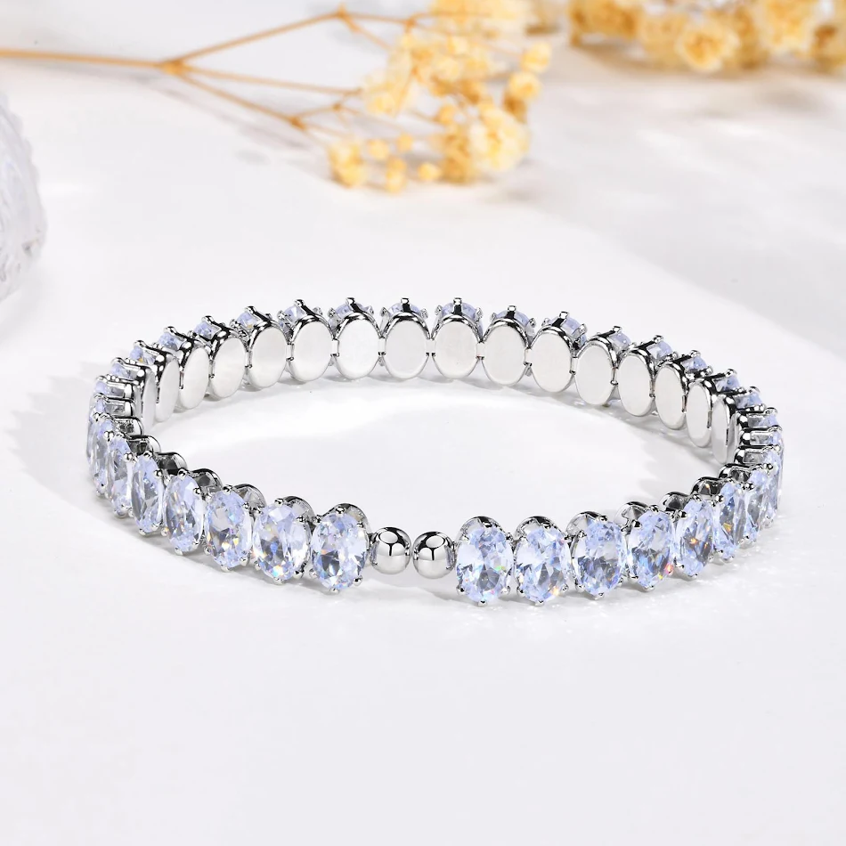 Mode damesarmband met kleurrijke ovale zirkonia, een stijlvol sieraad dat elke outfit verfraait en een vleugje elegantie toevoegt.