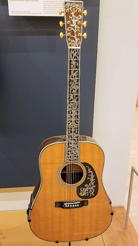 Music Instrument Museum (MIM) Geographic galleries, D-50 Deluxe Guitar fro Pennsylvania, 2001. At the time of its completion, this was the most elaborate Martin guitar model ever made.