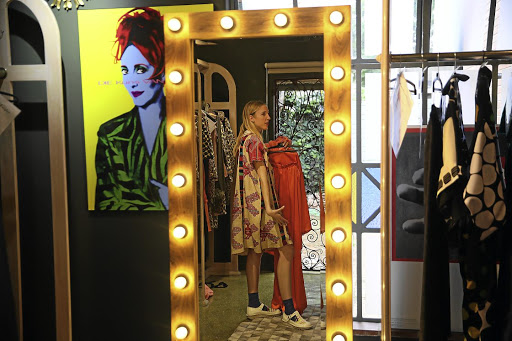 Lezanne Viviers prepares for the Marianne Fassler show at Fashion Week Joburg.