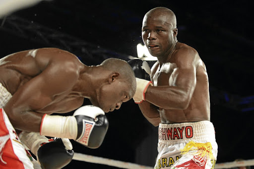 Kaizer Mabuza and Isaac Hlatshwayo during their welterweight bout in Sandton in this file picture.