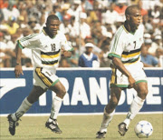 UNCOMPROMISING: Bafana Bafana legend John Moeti, left, says great win against France, though SA has not improved from 2002 World Cup. He is seen in this archive photo on national duty with team-mate Quinton Fortune. Pic. VELI NHLAPO. 1206/2000. © Sowetan.