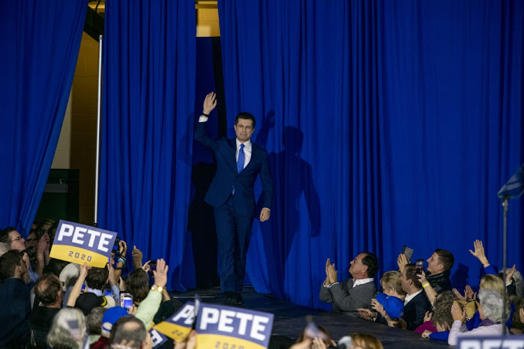 Pete Buttigieg, former mayor of South Bend and 2020 presidential candidate, greets the crowd during a primary night rally in Nashua, New Hampshire, the US, on February 11 2020. Picture: BLOOMBERG/KATE FLOCK