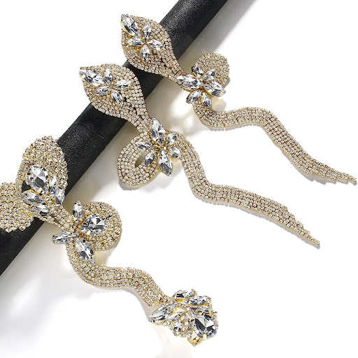 Title 3, Niche Design Rhinestone Snake Earrings. Add a t...