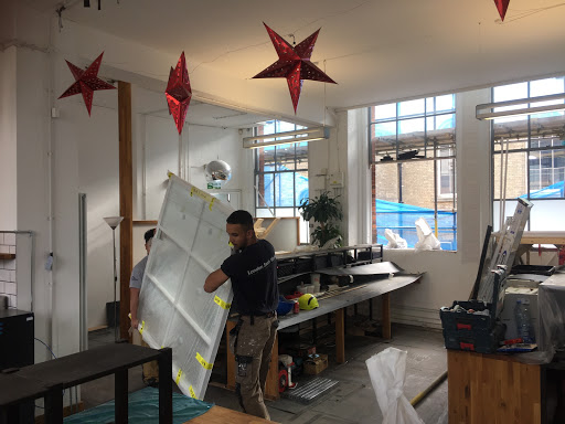 replace 24 large sash windows to commercial property in Islington