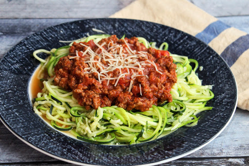 Zoodles topped with tomato sauce and cheese.