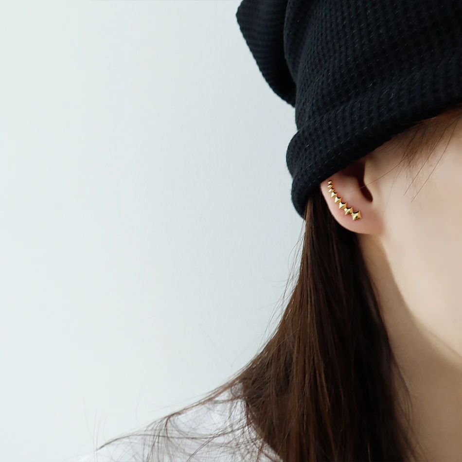 Boucles d'oreilles losange à motif géométrique tendance. La section transversale crée des motifs uniques, parfaites pour sublimer votre look.