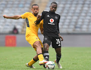 Reeve Frosler of Kaizer Chiefs challenges Bandile Shandu of Orlando Pirates in the DStv Premiership Soweto derby match at Orlando Stadium on the March 5 2022.