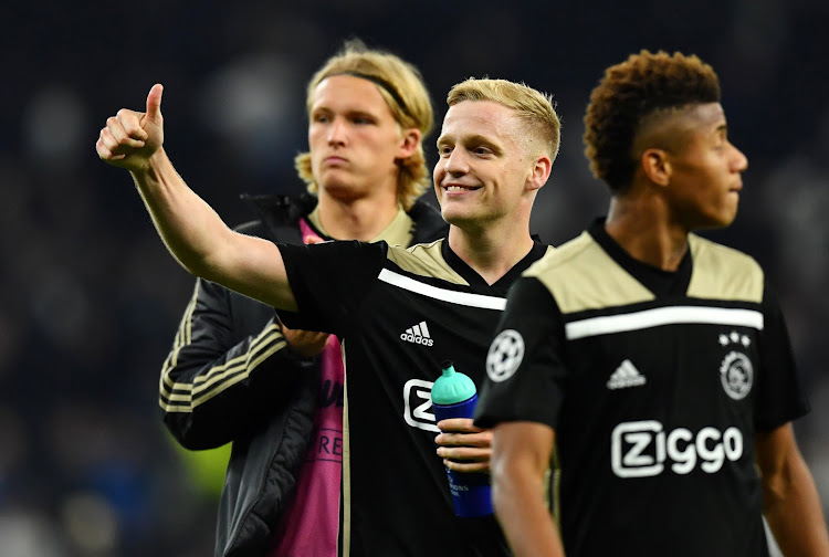 Ajax Amsterdam's Donny van de Beek celebrates after the 1-0 Uefa Champions League first leg semifinal win over Tottenham Hotspur at Tottenham Hotspur Stadium in London on April 30 2019.