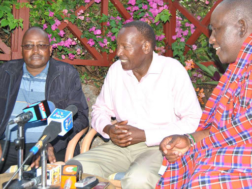 Interior Cabinet Secretary Major Gen. Rtd Joseph Nkaissery with Kajiado Senator Peter Mositet and Kajiado West MP Moses Ole Sakuda address journalists in Mombasa on September 4,2016. /JOHN CHESOLI