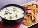 Slow-Cooker Green Chile Queso Dip was pinched from <a href="http://www.pillsbury.com/recipes/slow-cooker-green-chile-queso-dip/478c6368-435a-4a6f-b998-321f574a3d4d" target="_blank">www.pillsbury.com.</a>