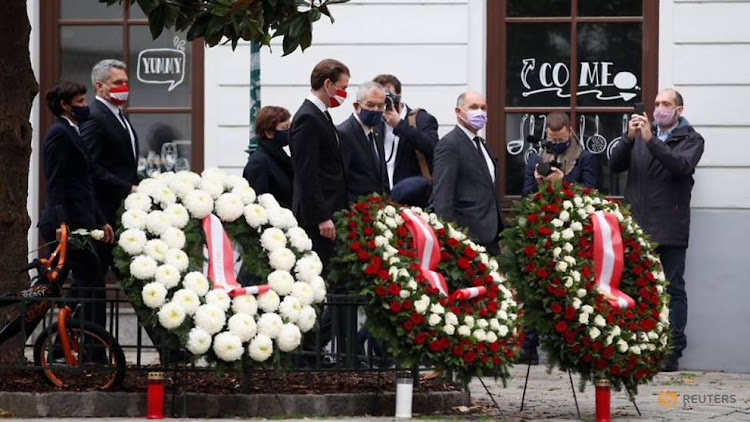 Austria Chancellor Sebastian Kurz, President Alexander van der Bellen and President of Parliament Werner Sobotka attend a wreath laying ceremony after a gun attack in Vienna, Austria Nov 3, 2020.