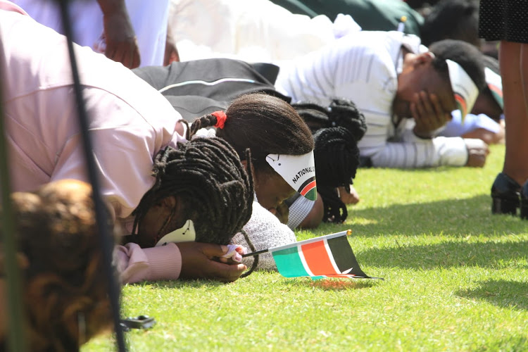 Faithfuls praying