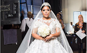 Zodwa dressed up in a wedding dress.
