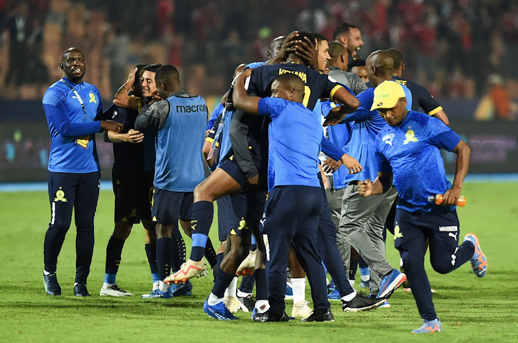 Mamelodi Sundowns players and technical staff celebrate their semifinal victory, with a 0-0 second leg result to make a 1-0 aggregate win, in their African Football League clash against Al Ahly at Cairo International Stadium in Egypt on Wednesday. Picture: MOSTAFA EMIRA/BACKPAGEPIX