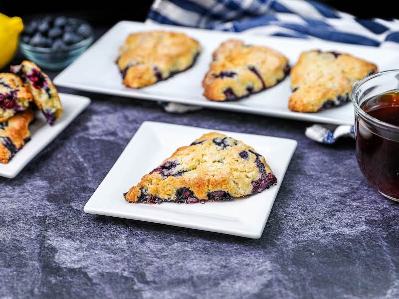 Golden Brown Blueberry Scone On A Plate.