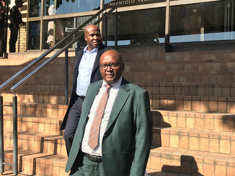 Former state security minister Bongani Bongo and his Co-accused Herrington Dlamini leaving the Nelspruit magistrates court on Monday.