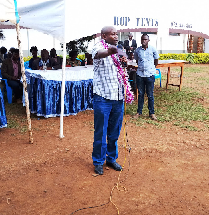 Lugari MP Ayub Savula addresses parents, teachers and students of Aligula Secondary School in Likuyani on Friday