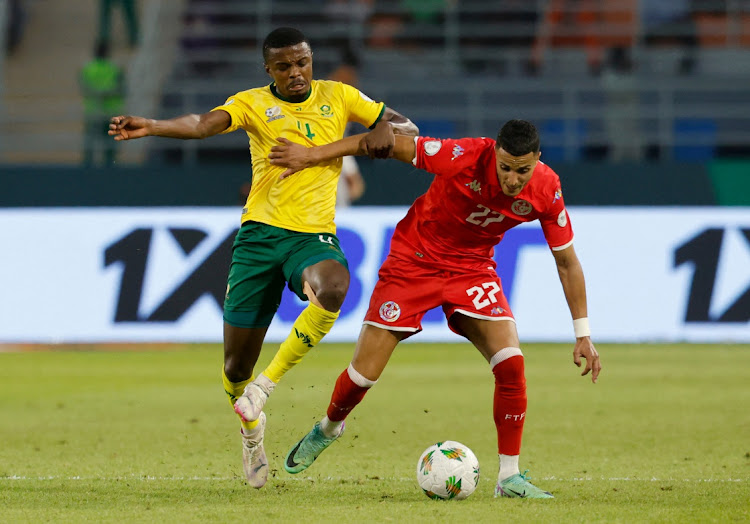 Bafana Bafana's Teboho Mokoena challenges Tunisia's Elias Achouri in their Africa Cup of Nations group E clash at Stade Amadou Gon Coulibaly in Korhogo, Ivory Coast, on January 24 2024.