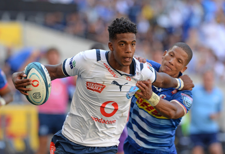 Canan Moodie of the Bulls in a tussle with Manie Libbok of the Stormers during their United Rugby Championship clash at Cape Town Stadium on Saturday.