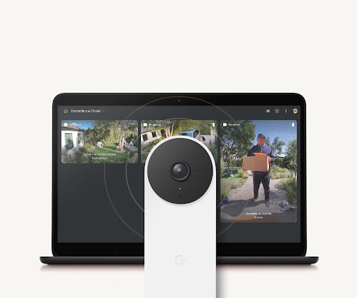 A Nest Doorbell in front of a computer showing live footage from the Front Door Cam