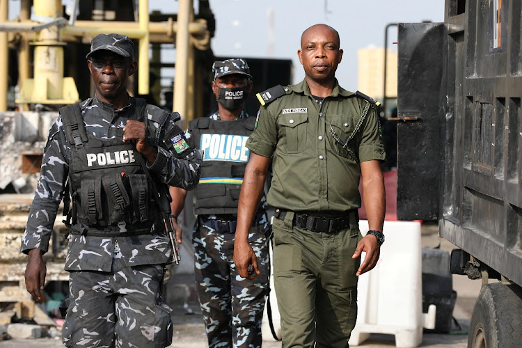 Police officers are seen during a protest earlier this year.