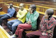 camera shy:
       Sonwabo Ngcete, Khuselo Manta, Siyamthanda Ndiza and Siyabongo Mhlangu yesterday appear in the Port Elizabeth High Court. The four men are charged with robbery while Ngcete and Manta are charged with committing acts of sexual penetration 
      
      
      
       PHOTO:  Brian Witbooi