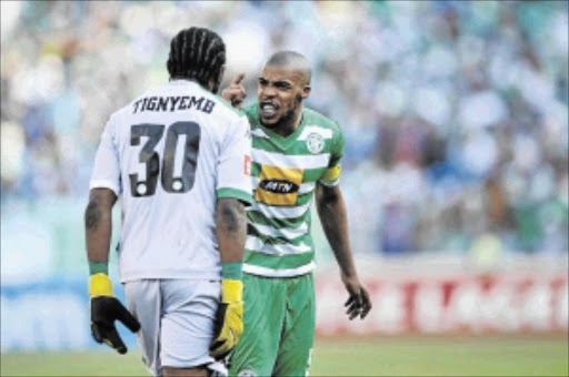 BLOWOUT: Celtic's Patrick Tignyemb and Wandisile Letlabika face offPhoto: Charle Lombard/Gallo Images