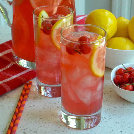 An easy fresh Cherry Lemonade recipe made from sour cherries and fresh lemons.  This refreshing beverage is perfect for all your summer barbecues and picnics.