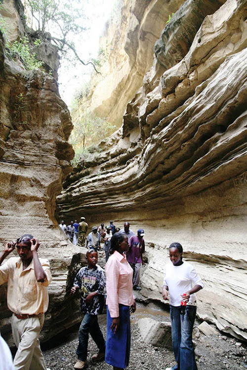 popular tourist attracton where tourists visit carved by thousands of years or water rosion of volcanic rock.