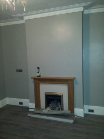 Repair and paint, install new floor, install new skirting, replace light fitting 