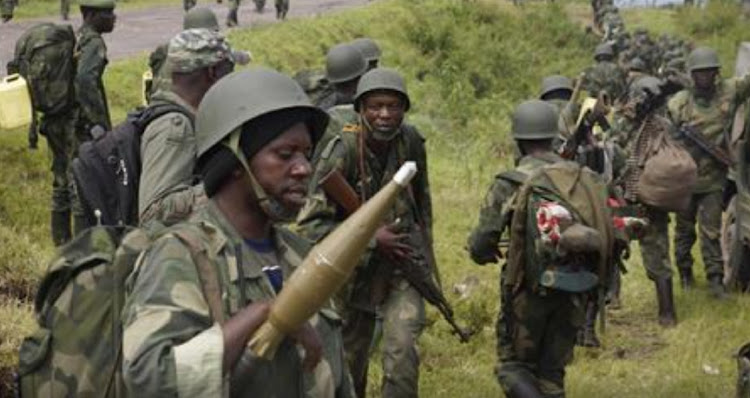 Soldiers on the move in the war in the Democratic Republic of the Congo.