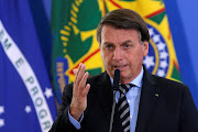 Brazil's President Jair Bolsonaro speaks during a ceremony at the Planalto Palace in Brasilia, Brazil, on November 26 2020. 