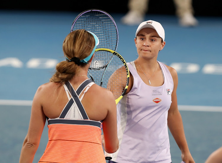 Ashleigh Barty, right, was defeated by Danielle Collins of the US during day three of the Adelaide International WTA 500 at Memorial Drive on February 24, 2021 in Adelaide